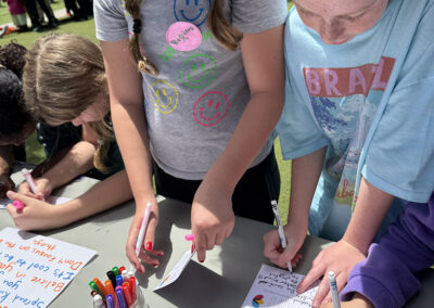 The 6th graders lead the lower grades in making "kindness kits."